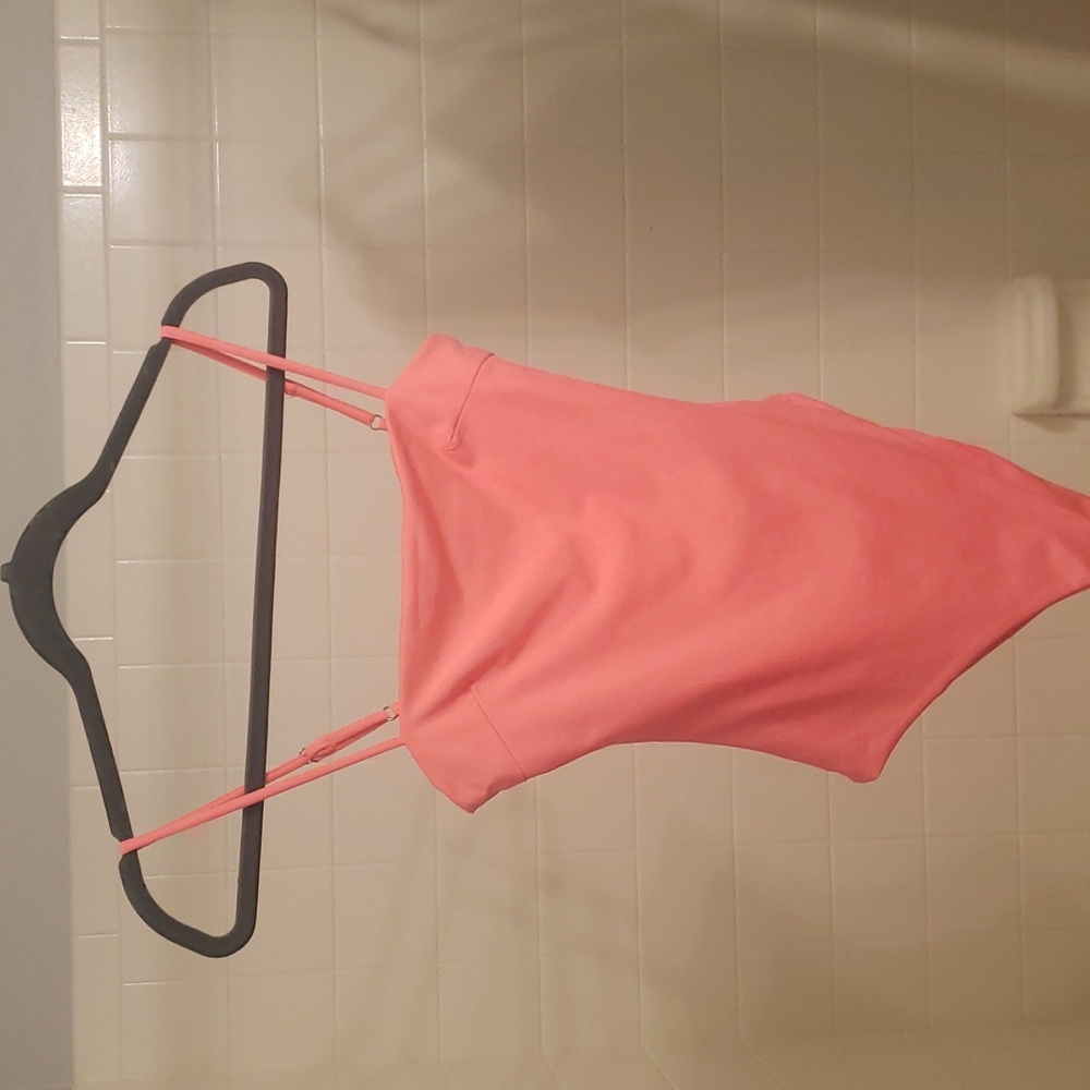 Hot pink snap body suit